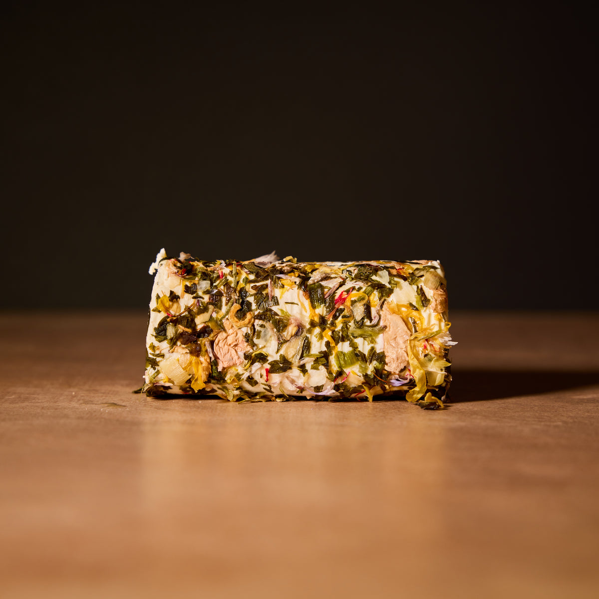 Goat's cheese with honey and flowers, alternative view